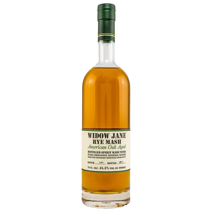 A bottle of Widow Jane American Oak Aged Rye Whiskey features amber liquid, a green cap, and a cream label with 45.5% ABV and branding from the renowned Brooklyn Distillery.