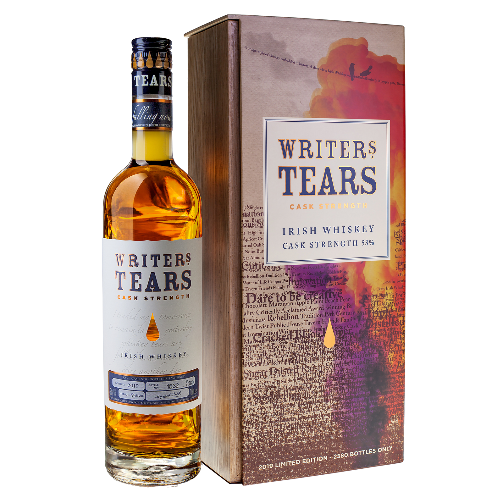 A bottle of Writers Tears 2019 Cask Strength Irish Whiskey stands beside its teardrop-adorned box, labeled “2019 Limited Edition - 2580 Bottles Only,” making this cask strength whiskey a rare collector’s item.