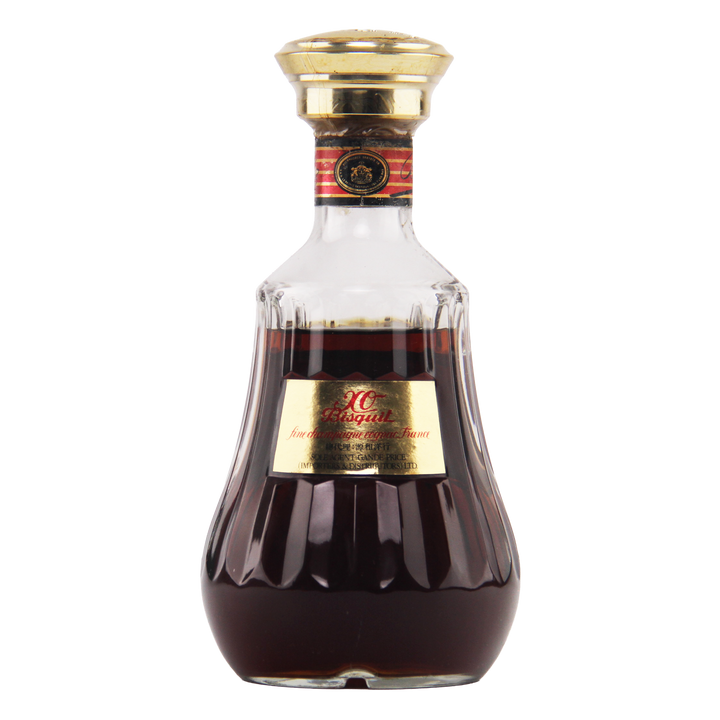 Bottle of X.O. Brandy with a gold cap and label on a white background