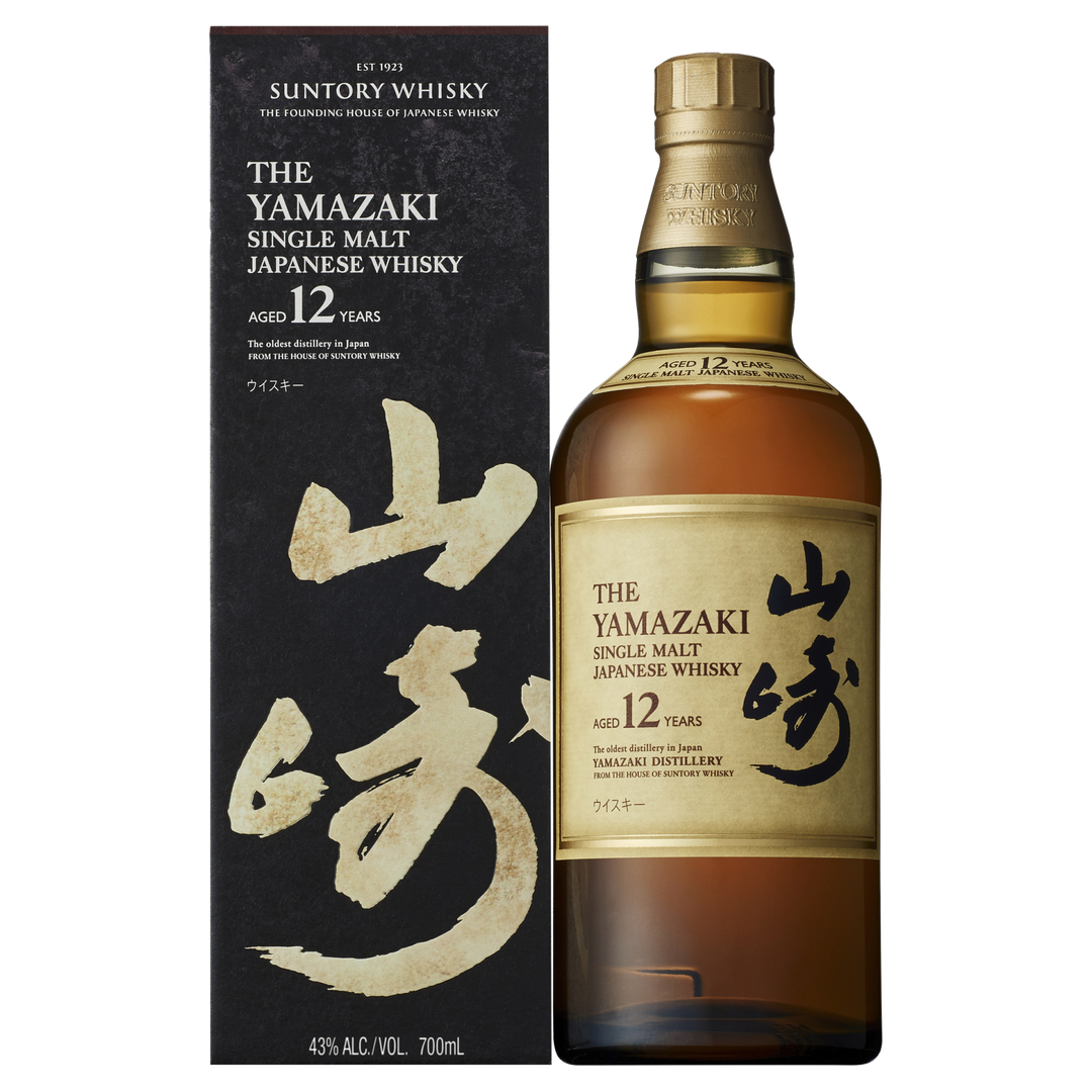 A bottle of Yamazaki 12 Year Old Single Malt Japanese Whisky stands beside its matching black and gold box, both featuring bold Japanese script and highlighting its 43% ABV, 700ml size, from the renowned Suntory Yamazaki Distillery.