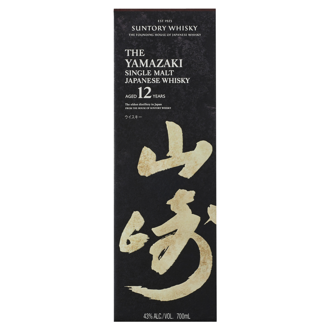 A rectangular black box for Yamazaki 12 Year Old Single Malt Japanese Whisky features gold Japanese calligraphy, white product details, and the Suntory Whisky logo at the top.