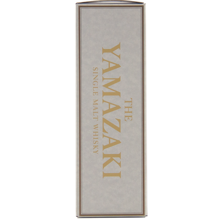 A rectangular box with a light gray background and gold lettering reading YAMAZAKI 10 YEAR OLD JAPANESE SINGLE MALT WHISKY vertically, celebrating Suntory’s 100th Anniversary—a true limited-edition collector’s piece.