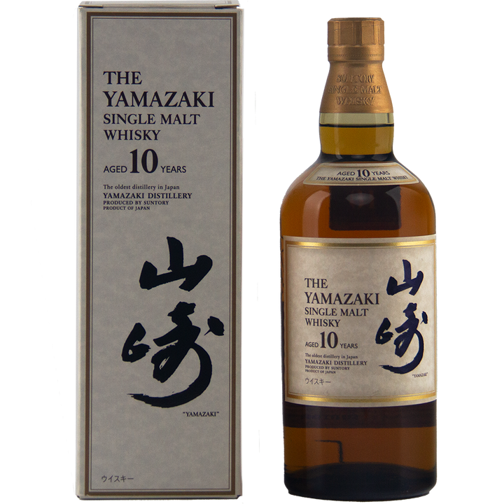 A bottle of Yamazaki 10 Year Old Japanese Single Malt Whisky stands beside its matching box, both featuring Japanese calligraphy and gold and cream labels—crafted by Suntory for their 100th Anniversary.
