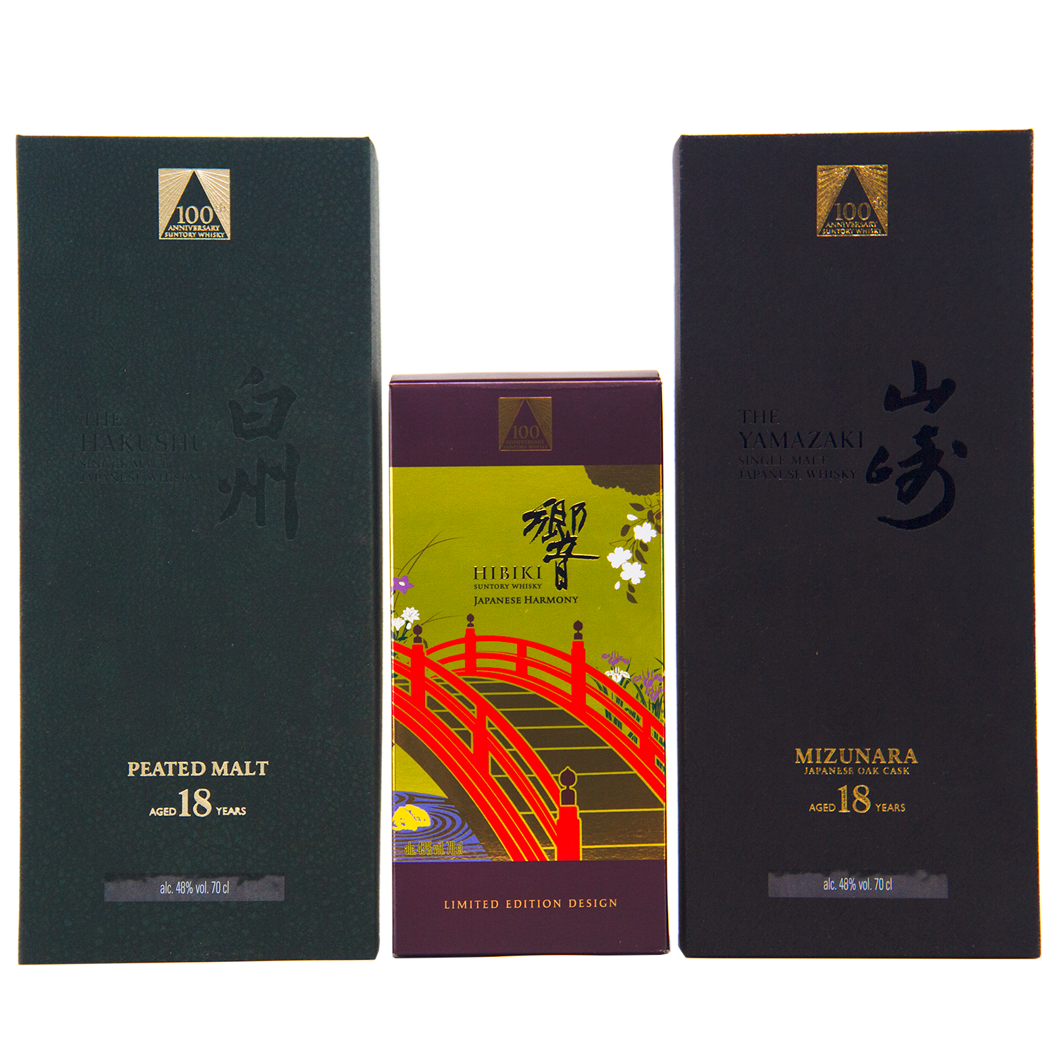 Three Japanese whisky boxes are displayed: Hakushu 18 (green box), Hibiki 100th Anniversary Set (colorful box with a red bridge), and Yamazaki 18—a highlight of the anniversary set.