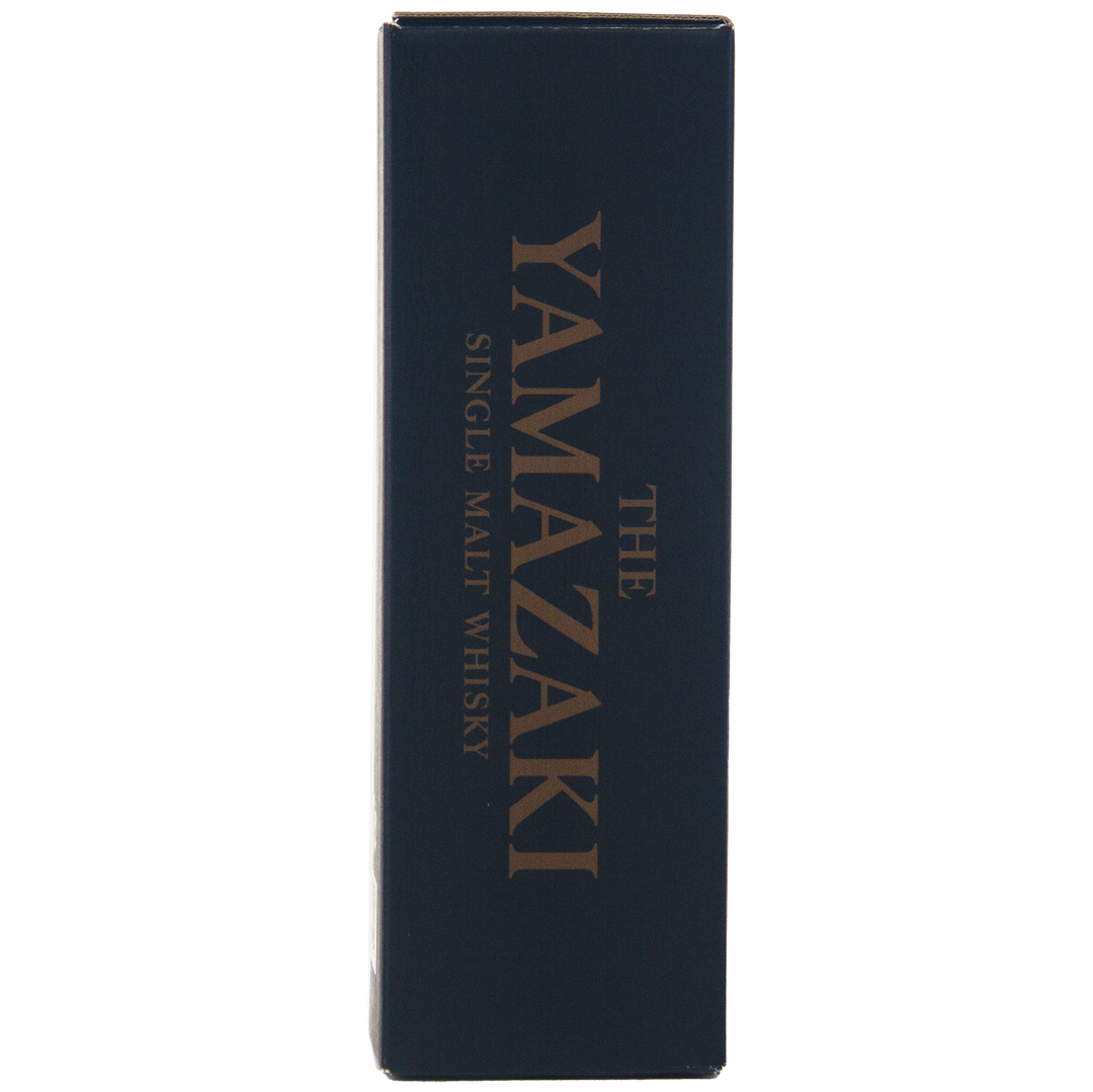 A dark blue rectangular box with gold text reading Yamazaki 18 Year Old Japanese Single Malt Whisky vertically along the side.