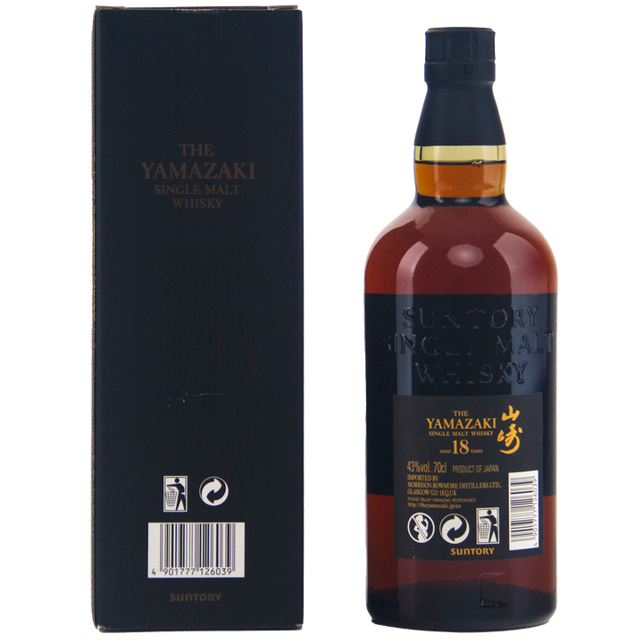A bottle of Yamazaki 18 Year Old Japanese Single Malt Whisky stands beside its black box packaging, both featuring gold and white text along with Japanese characters.