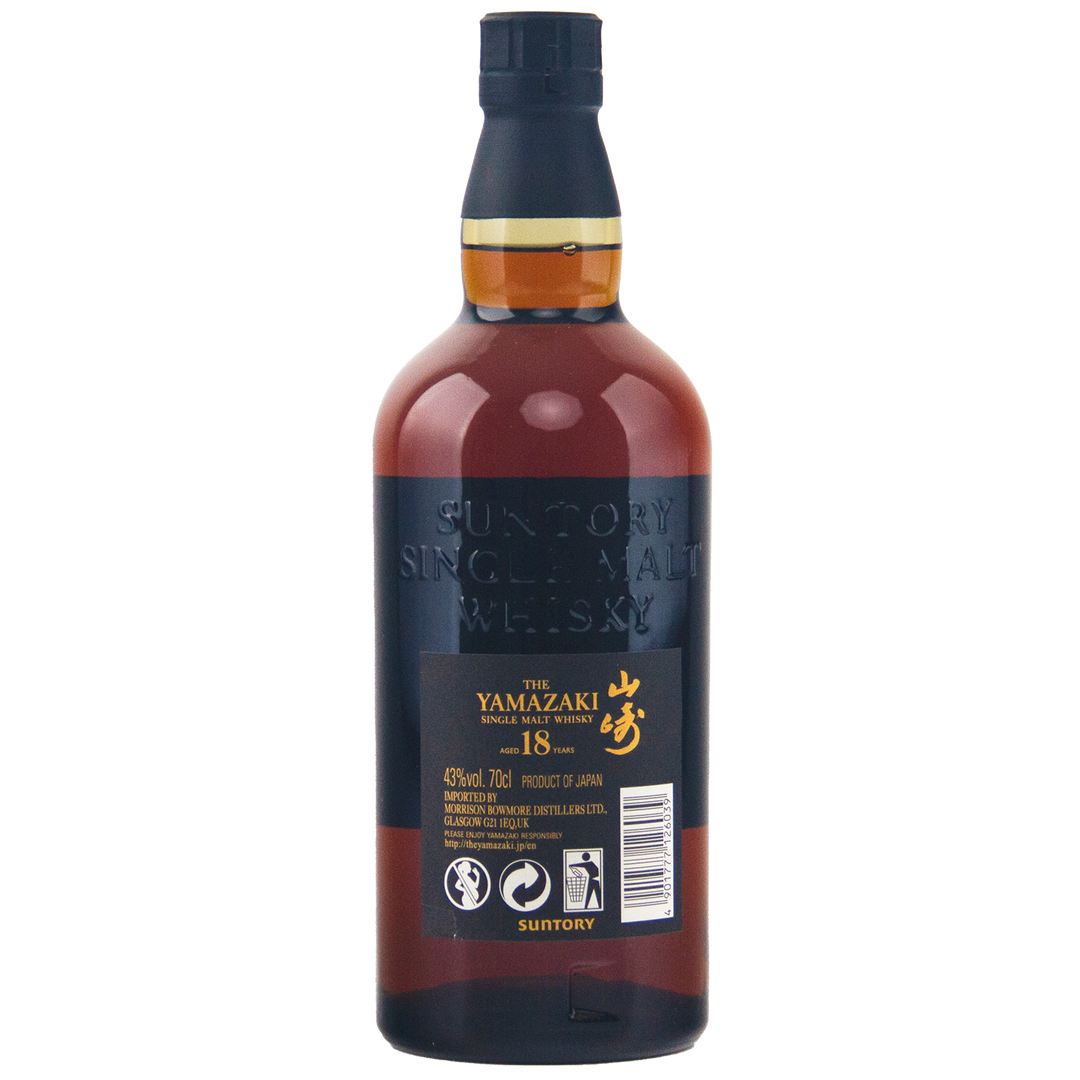 A bottle of Yamazaki 18 Year Old Japanese Single Malt Whisky, with its dark amber hue, black and gold label, and gold Japanese characters, stands elegantly against a white background.