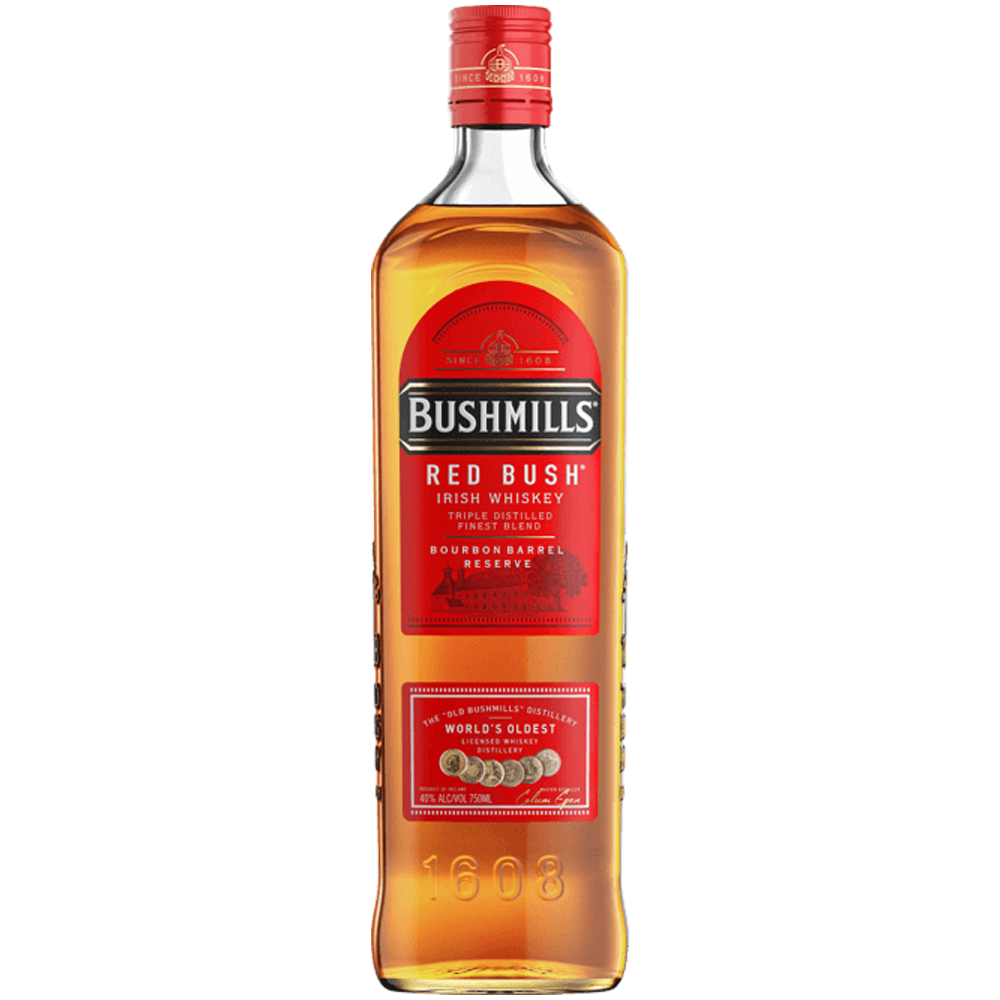 A bottle of Bushmills Red Bush Irish Whiskey, featuring a red label, gold lettering, and a red cap with "Bourbon Barrel Reserve" and "1608" embossed on the glass—this smooth blend is aged in bourbon casks.