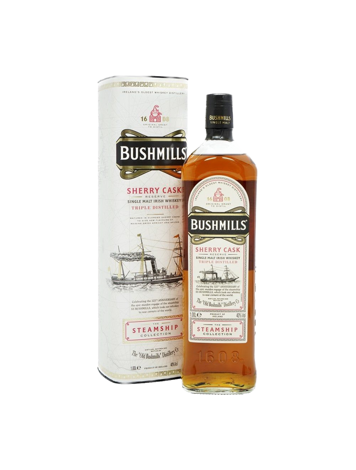 A bottle of Bushmills Steamship Sherry Cask Reserve Irish Whiskey is displayed alongside its cylindrical packaging, both adorned with a ship illustration and cream-colored labels accented in gold, black, and red.