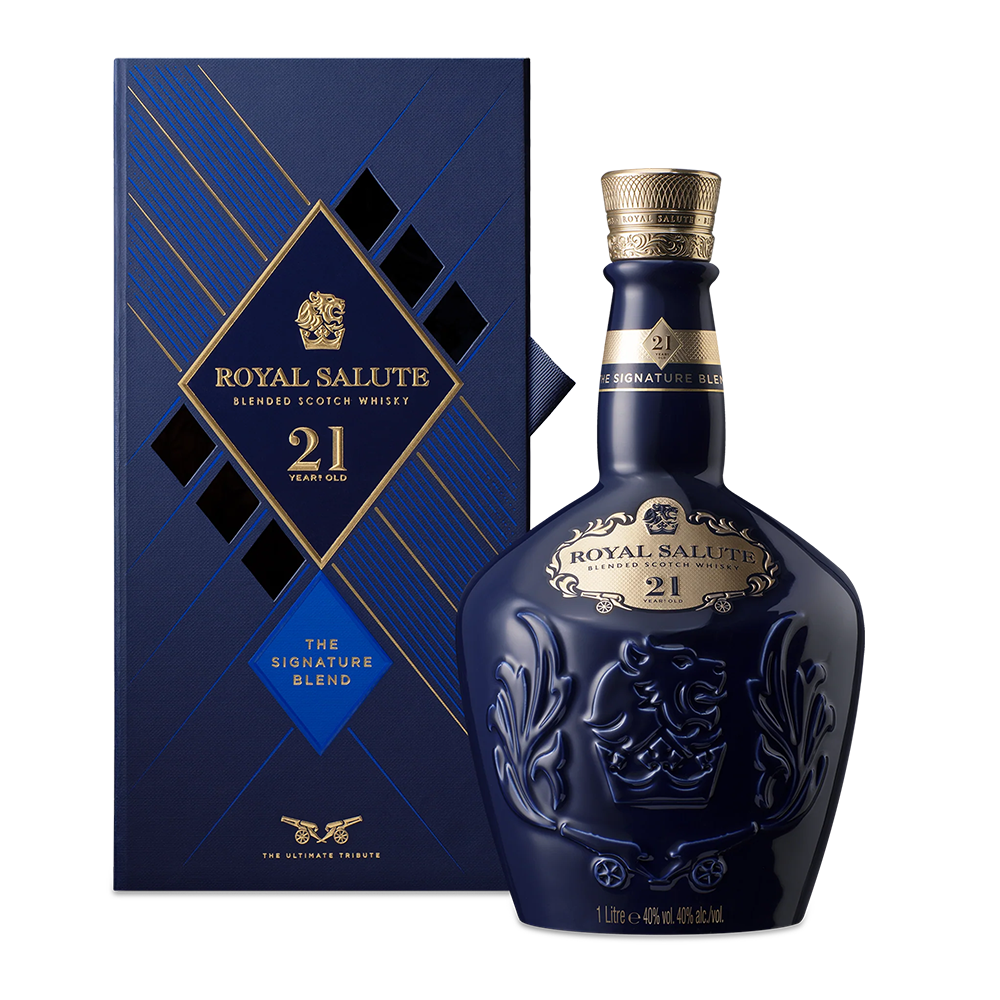 A blue bottle of Royal Salute 21 Year Old Blended Scotch Whisky sits before its matching blue and gold gift box, both adorned with elegant gold accents and the signature blended Scotch whisky branding.