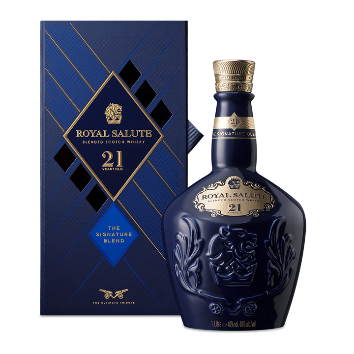 A blue bottle of Royal Salute 21 Year Old Blended Scotch Whisky sits before its matching blue and gold gift box, both adorned with elegant gold accents and the signature blended Scotch whisky branding.