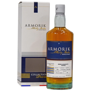 A bottle and box of the smooth Armorik Pineau des Charentes French Single Malt Whisky.