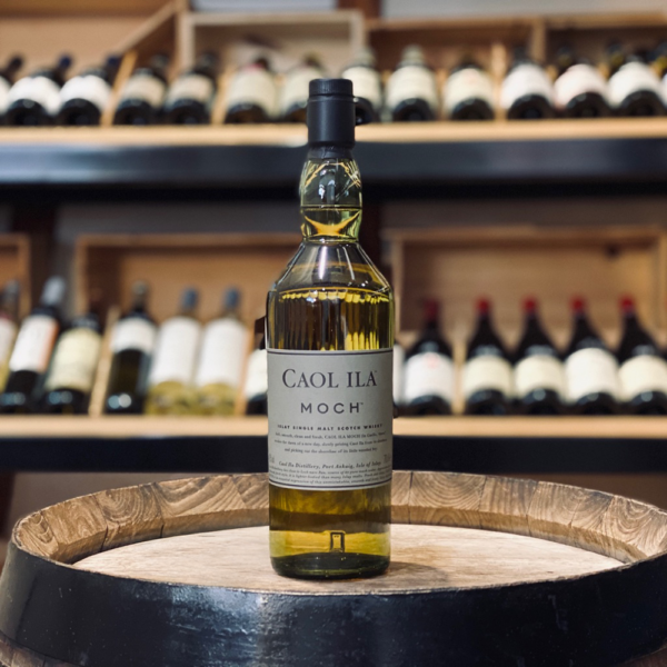 Caol Ila Moch Single Malt Scotch Whisky bottle from Islay, in a wine and whisky room - Whisky Estate