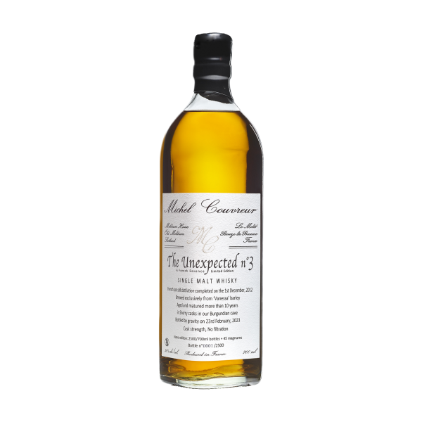 "Michel Couvreur Unexpected #3 whisky bottle available at Whisky Estate, featuring a sophisticated design that emphasizes its unique character. The clear glass bottle showcases the rich amber whisky, highlighting its complex flavor profile with notes of dried fruits, spices, and a hint of oak, representing the craftsmanship of artisanal whisky production."