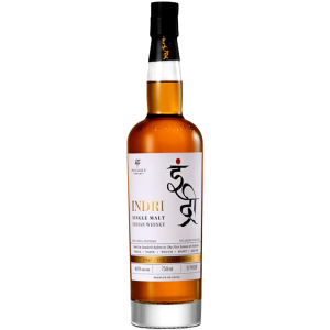"Indri Trini Single Malt Indian Whisky bottle and box available at Whisky Estate, featuring a sleek, tall amber glass bottle showcasing this unique Indian single malt. The stylish packaging highlights its triple-cask maturation in ex-bourbon, French wine, and PX sherry casks, resulting in a complex profile with notes of honey, dried fruit, and subtle spices."