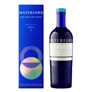 "Waterford Organic Gaia: Edition 2.1 bottle and box set available at Whisky Estate, showcasing a modern design with an organic-themed label that highlights the whiskey's sustainable production. The dark blue bottle conceals the whiskey inside, while the beautifully designed box reflects the premium quality and craftsmanship that define this unique expression."