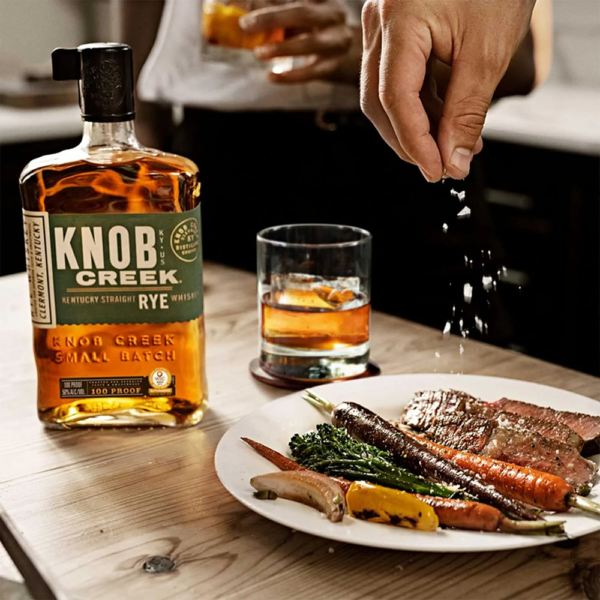Knob Creek Kentucky Straight Rye Whiskey enjoyed with some steak and veggies at the bar - Whisky Estate