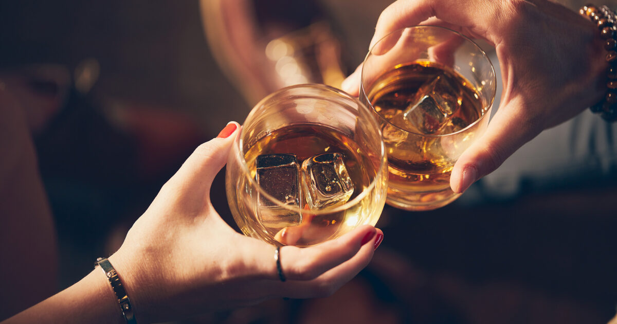 Friends enjoying single malt whisky Friends enjoying single malt whisky