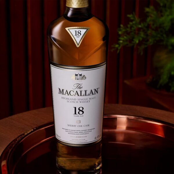 The Macallan 18 Year Old Sherry Oak 2024 Release is a beautifully crafted single malt, matured exclusively in hand-selected sherry-seasoned oak casks from Jerez, Spain. - Whisky Estate